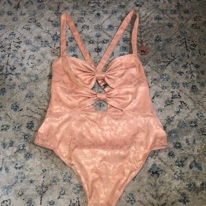 Pink Free People Cutout Bodysuit